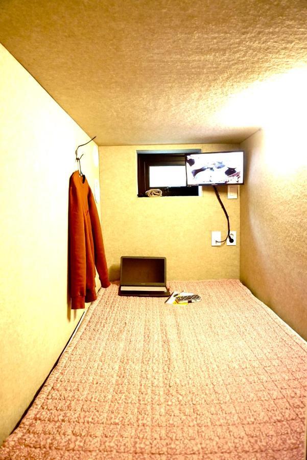 Capsule M Hostel *